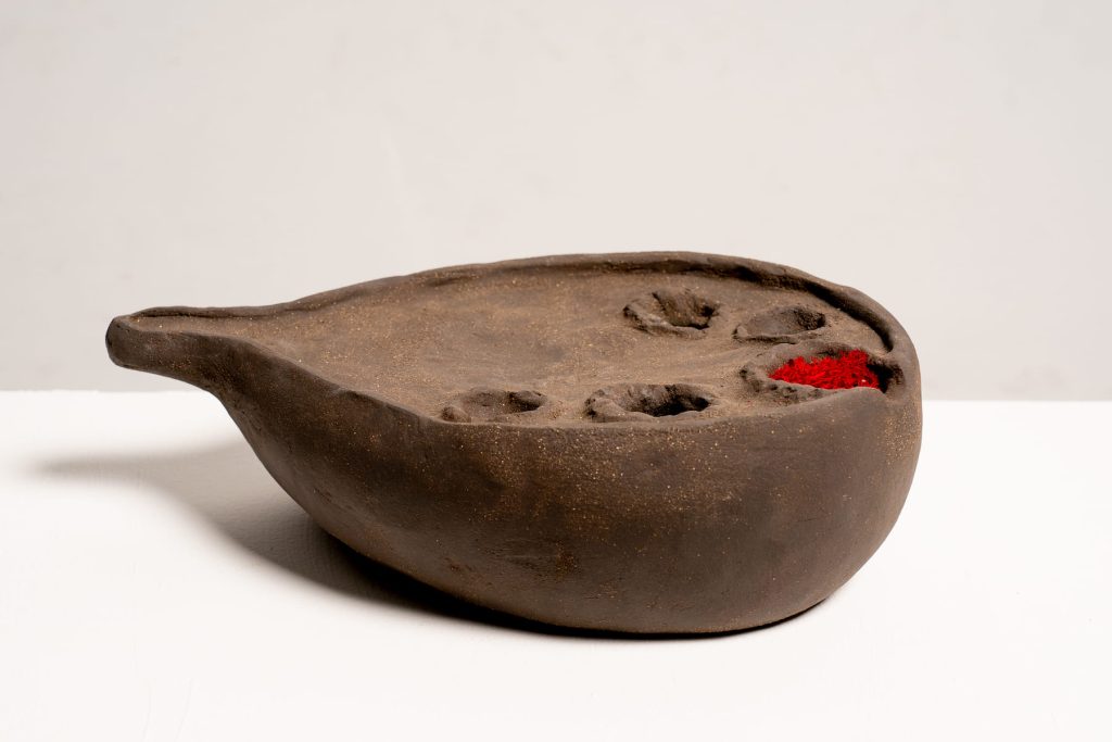 Ovario en barro cocido